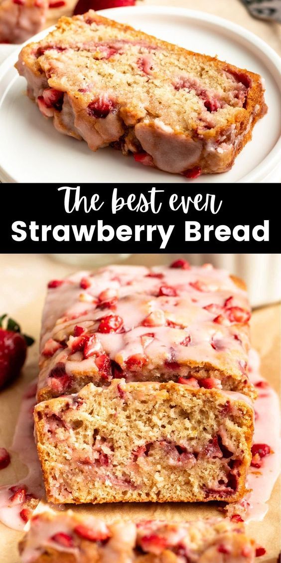 Slices of moist strawberry bread with visible pieces of strawberries on a wooden board, fresh berries and a mug of tea nearby.