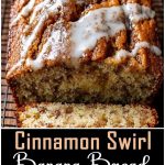 Sliced banana bread with cinnamon on a wooden board, with a golden crust and a soft moist crumb, next to cinnamon sticks and a slice of banana.