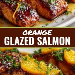 Orange-glazed salmon with a golden crust, garnished with orange slices and herbs on the plate.