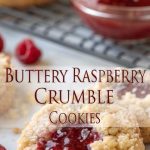 Crumbly cookies with raspberries and sweet jam filling on a plate