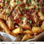 Crispy fries with chicken and fried bacon